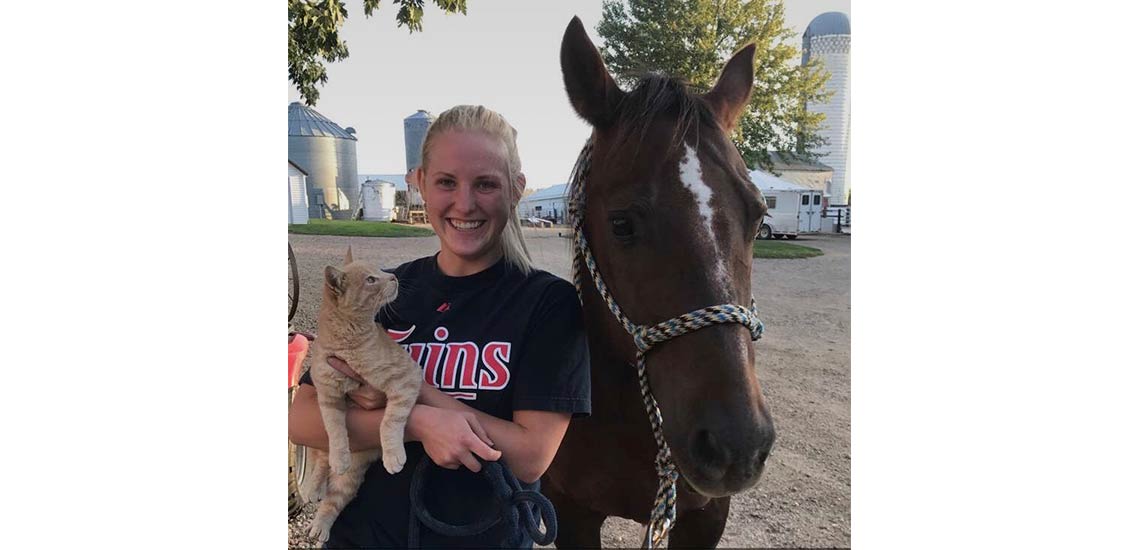 Christy with her new horse Cat and her actual cat Simba.